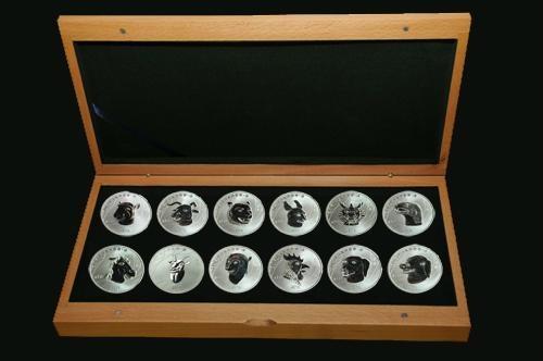 美国金币总公司特别授权北京民生泉集币公司为十二生肖兽首纪念银币